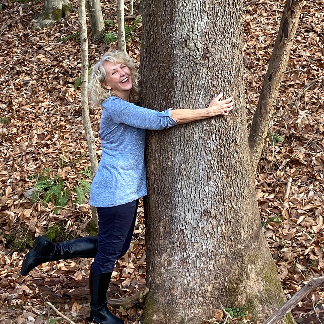 Julie Hugging A Tree